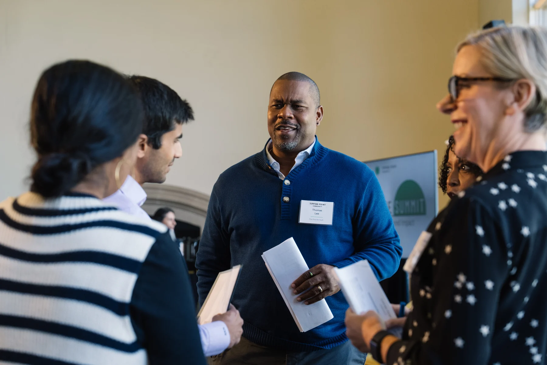 Participants in conversation during a small-group session at the Executive Summit.